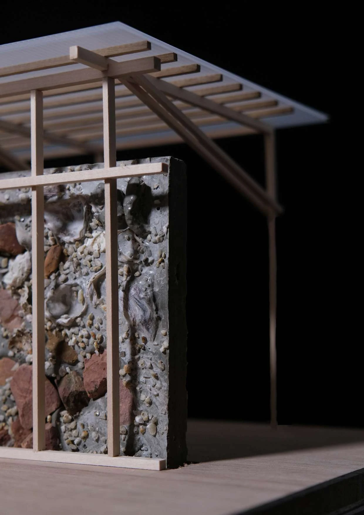 Timber architectural model incorporating a wall of weathered stone